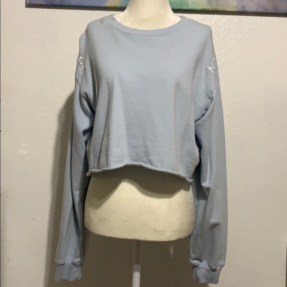 light blue crew neck